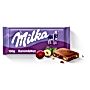 Milka Czekolada mleczna z rodzynkami i orzechami laskowymi 100 g